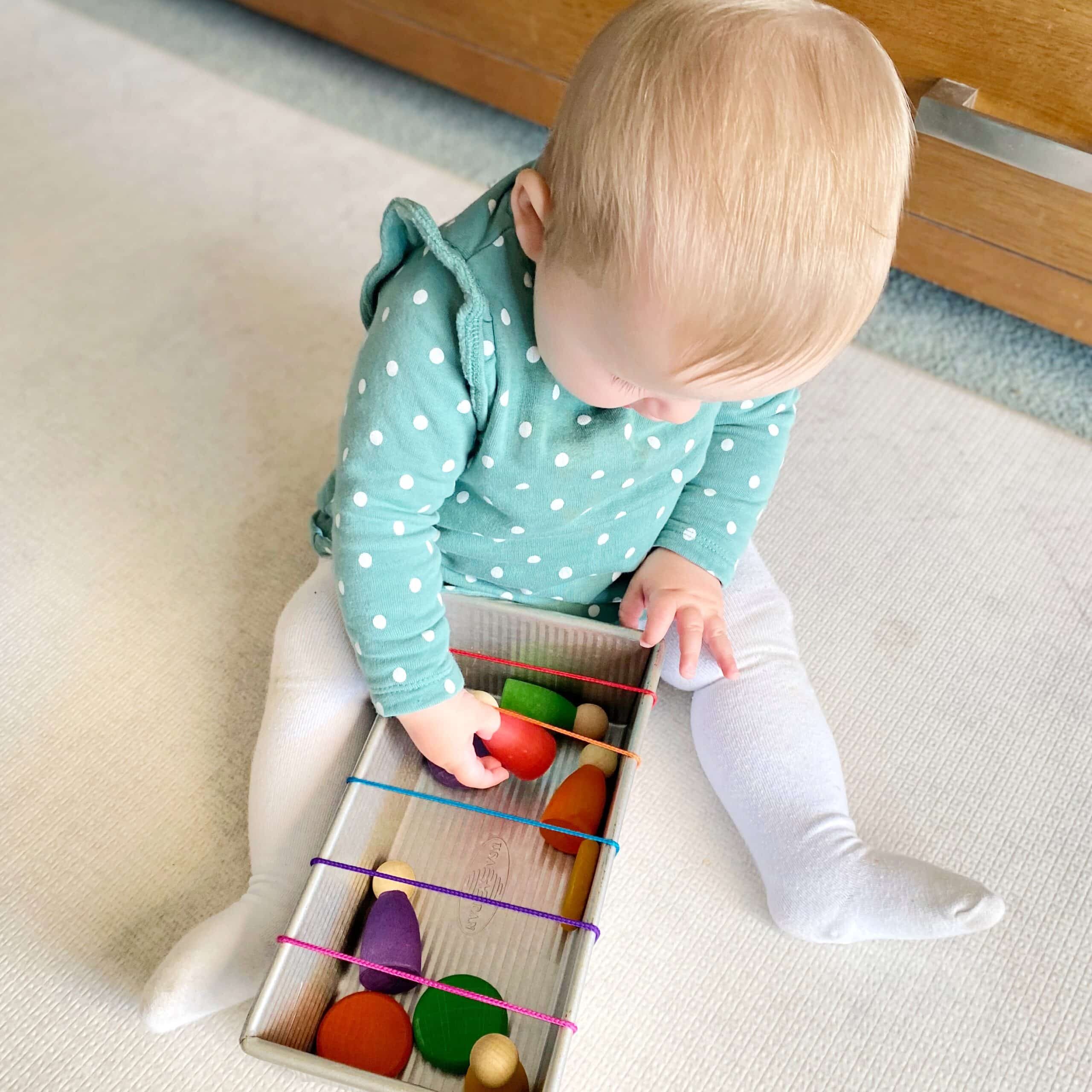 Out_In play in sitting with rubber band obstacles